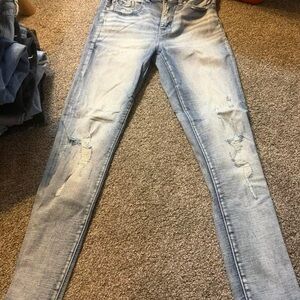 Buckle Light Blue Distressed Skinny Jeans